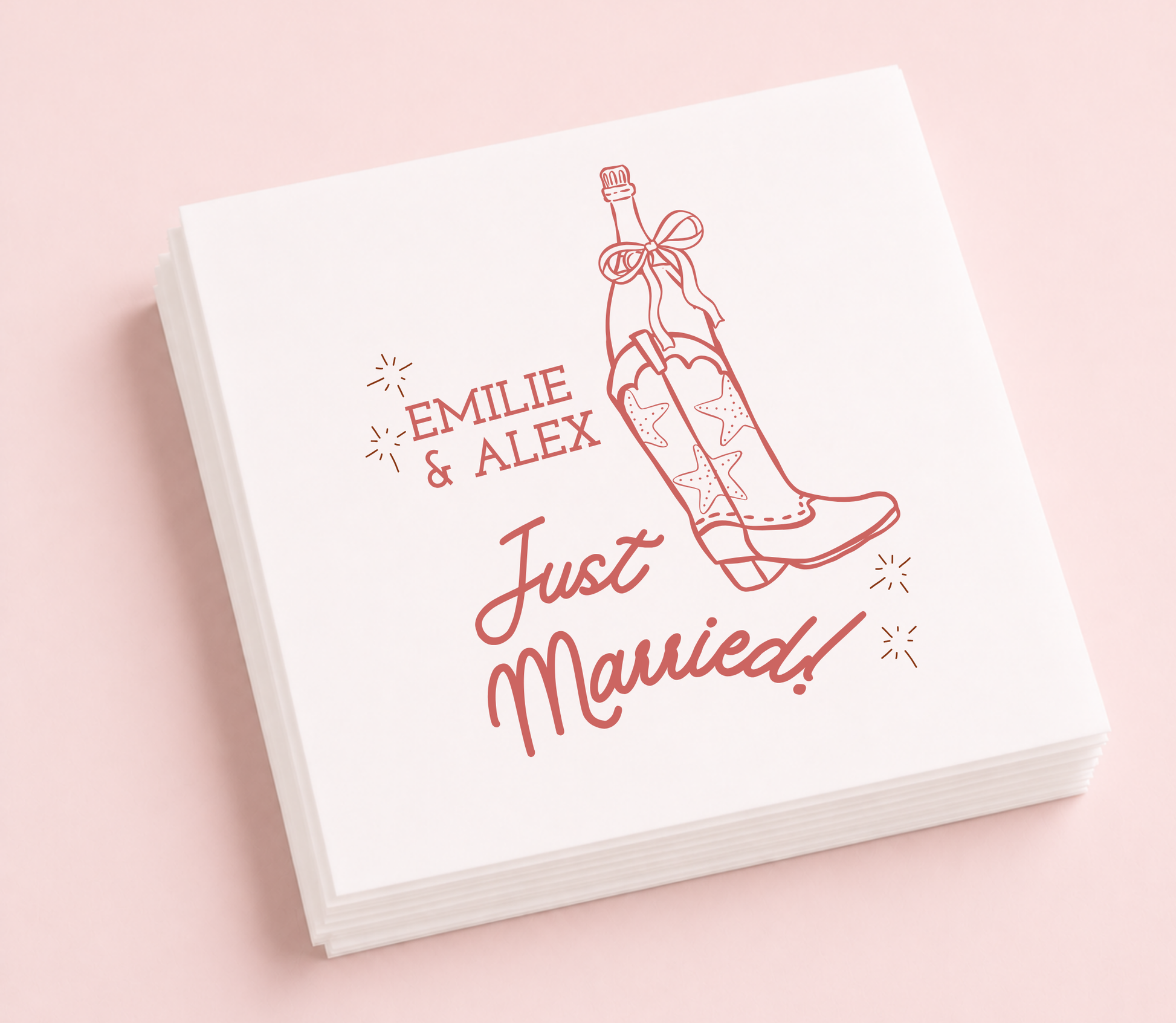 White personalized wedding cocktail napkin featuring a western cowboy boot illustration, custom names Emilie and Alex, and Just Married typography.