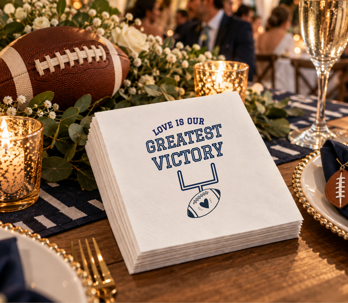 Personalized sports wedding napkins with navy blue football goalpost artwork and romantic wedding wording.