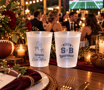Personalized sports wedding cups with football-inspired initials, navy lettering, surname, and wedding date.