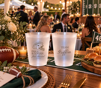 Personalized sports wedding cups with football helmet artwork, Just Married lettering, wedding date, and team personalization.`
