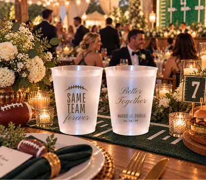 Personalized football wedding cups with a football lace design, elegant script lettering, and custom wedding details.