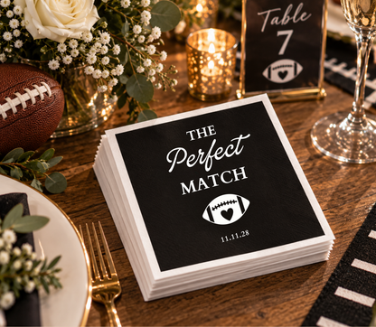 Black wedding cocktail napkins with The Perfect Match football design and personalized wedding date.