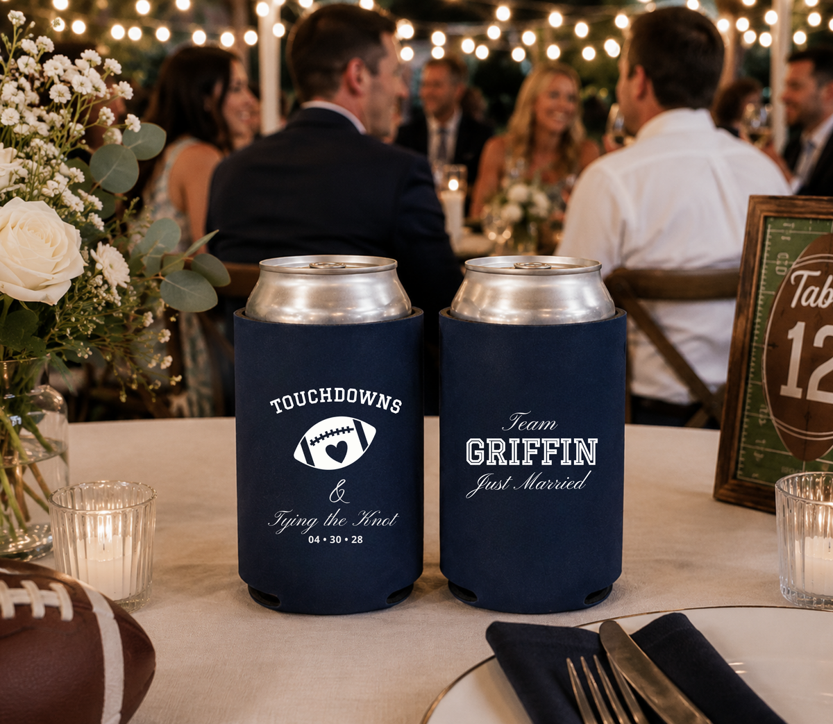 Custom football wedding favors with navy can coolers, football graphic, personalized team name, and wedding date.