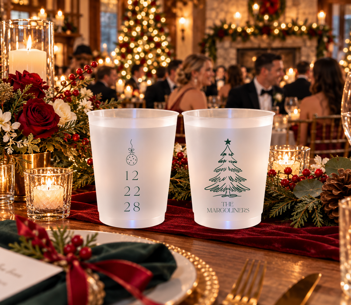 Custom holiday wedding cups featuring a delicate Christmas ornament and personalized Christmas tree design.