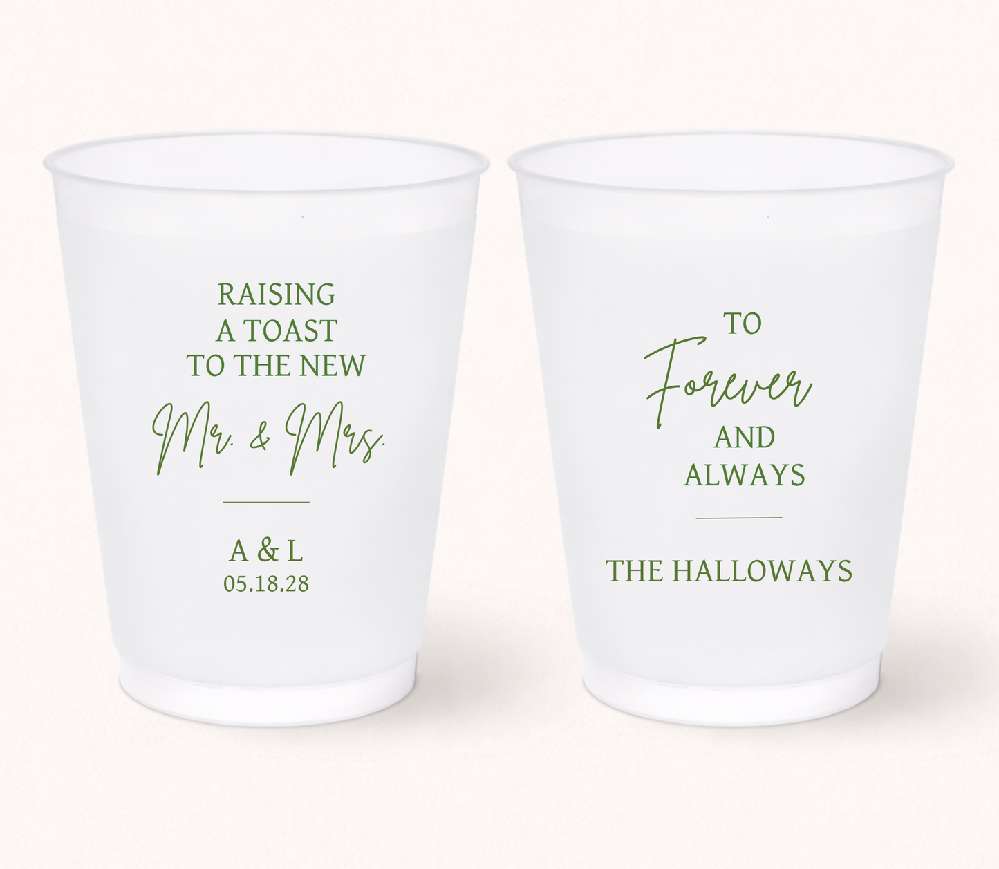 Personalized frosted wedding cups featuring green Raising a Toast to the New Mr. and Mrs. lettering, A and L initials, 05.18.28 wedding date, and The Halloways family name.

