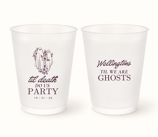 Personalized frosted Til Death Do Us Party ghost wedding cups featuring dark plum floral ghosts, Wellington surname, Til We Are Ghosts wording, and wedding date 10.31.28.