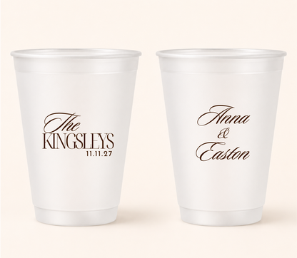 Personalized elegant script wedding frosted cups with custom names, family name, and wedding date