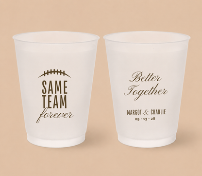 Personalized Same Team Forever football wedding cups featuring a football lace detail, elegant brown lettering, custom couple names, and wedding date.