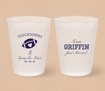 Personalized Touchdowns Tying The Knot football wedding cups featuring a football heart design, Team Griffin wording, Just Married details, and wedding date.