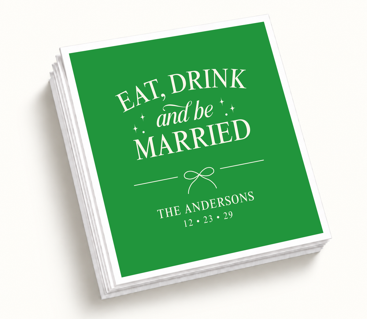 Personalized green Eat Drink And Be Married wedding napkins featuring white holiday typography, bow detail, custom couple names, and wedding date.