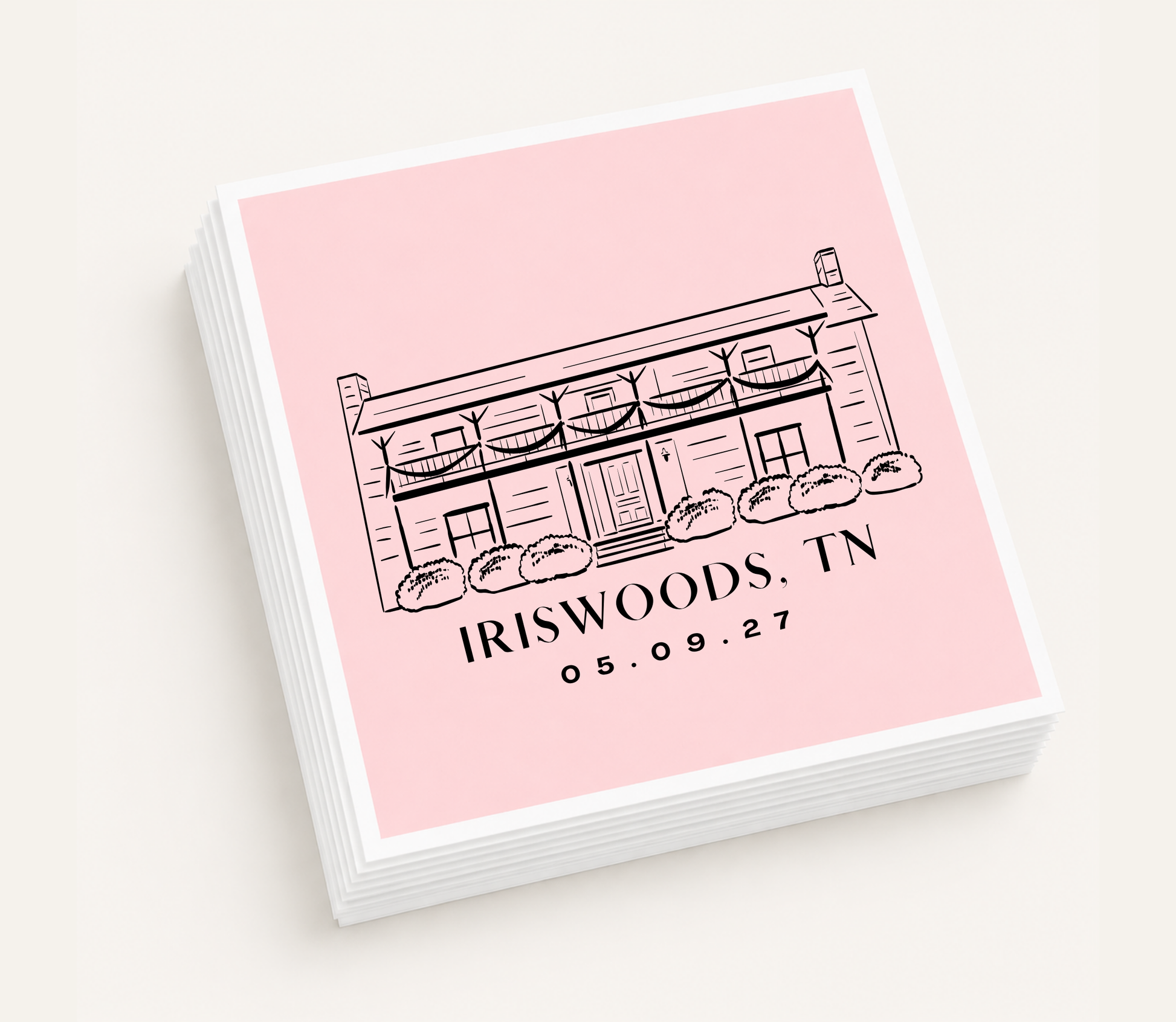 Personalized cocktail napkins featuring a custom illustration of the Iriswoods wedding venue in Tennessee.