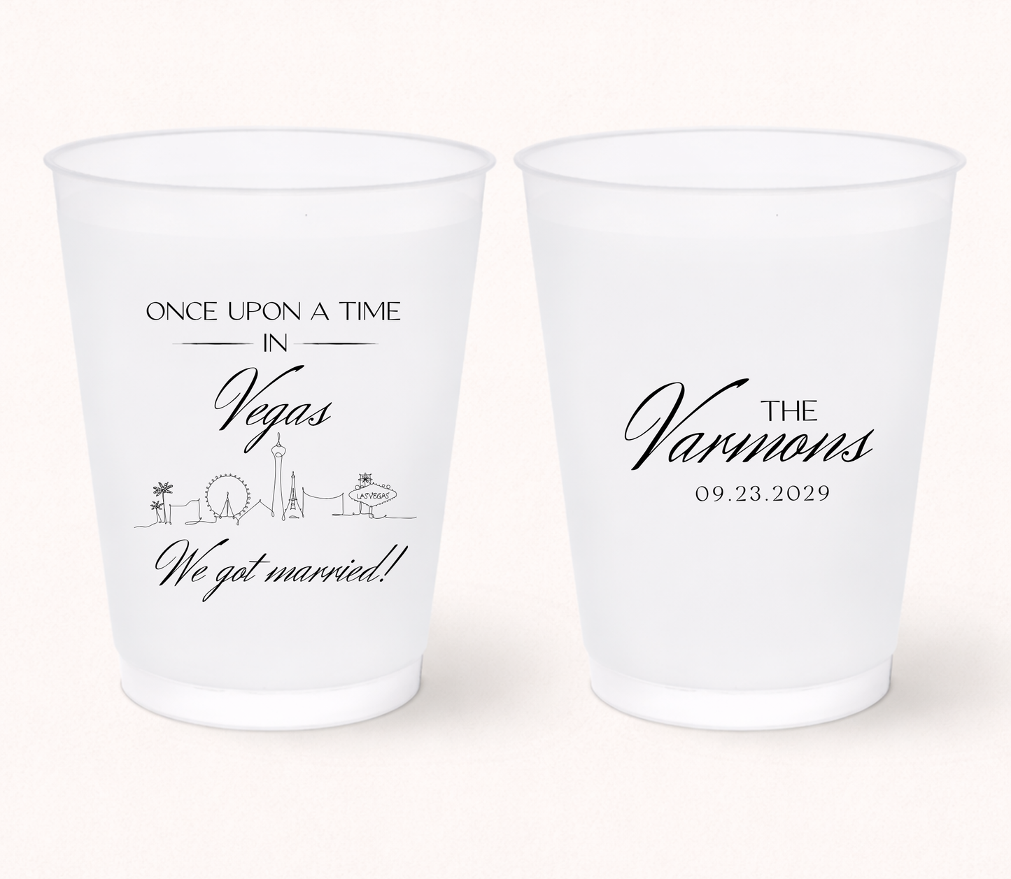 Custom Las Vegas wedding frosted cups with personalized names, destination inspired skyline artwork, and wedding details