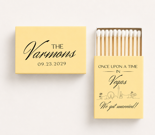 Personalized Las Vegas wedding matchboxes featuring custom family name, wedding date, and Vegas skyline with "Once Upon a Time in Vegas, We Got Married!" design.