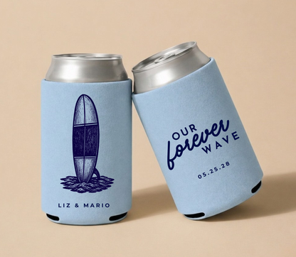 Light blue personalized wedding can coolers featuring a vintage surfboard illustration, custom couple names, and Our Forever Wave wedding design.

Personalized surf wedding can cooler with vintage surfboard illustration.

Custom beach wedding drink sleeve featuring a surfboard design.