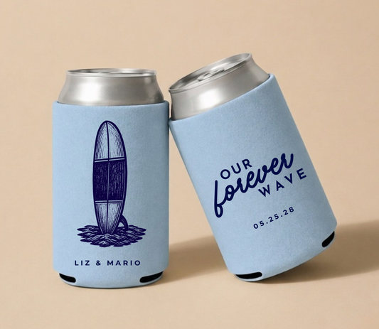 Light blue personalized wedding can coolers featuring a vintage surfboard illustration, custom couple names, and Our Forever Wave wedding design.

Personalized surf wedding can cooler with vintage surfboard illustration.

Custom beach wedding drink sleeve featuring a surfboard design.
