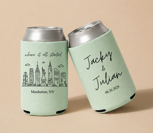 Mint green personalized wedding can coolers featuring a Manhattan skyline illustration, couple's names, and custom wedding date.
