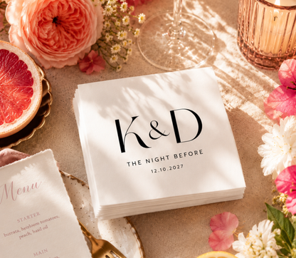 Personalized Night Before wedding napkins with black monogram initials, wedding date, and modern typography on white paper napkins