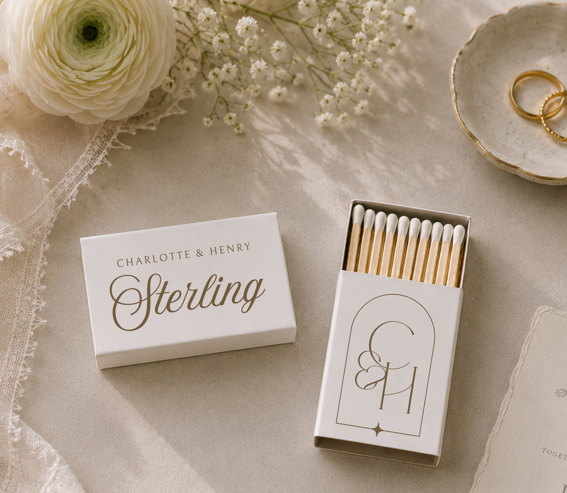 Personalized monogram wedding matchboxes with custom names, wedding date, and black framed initials on white matchboxes