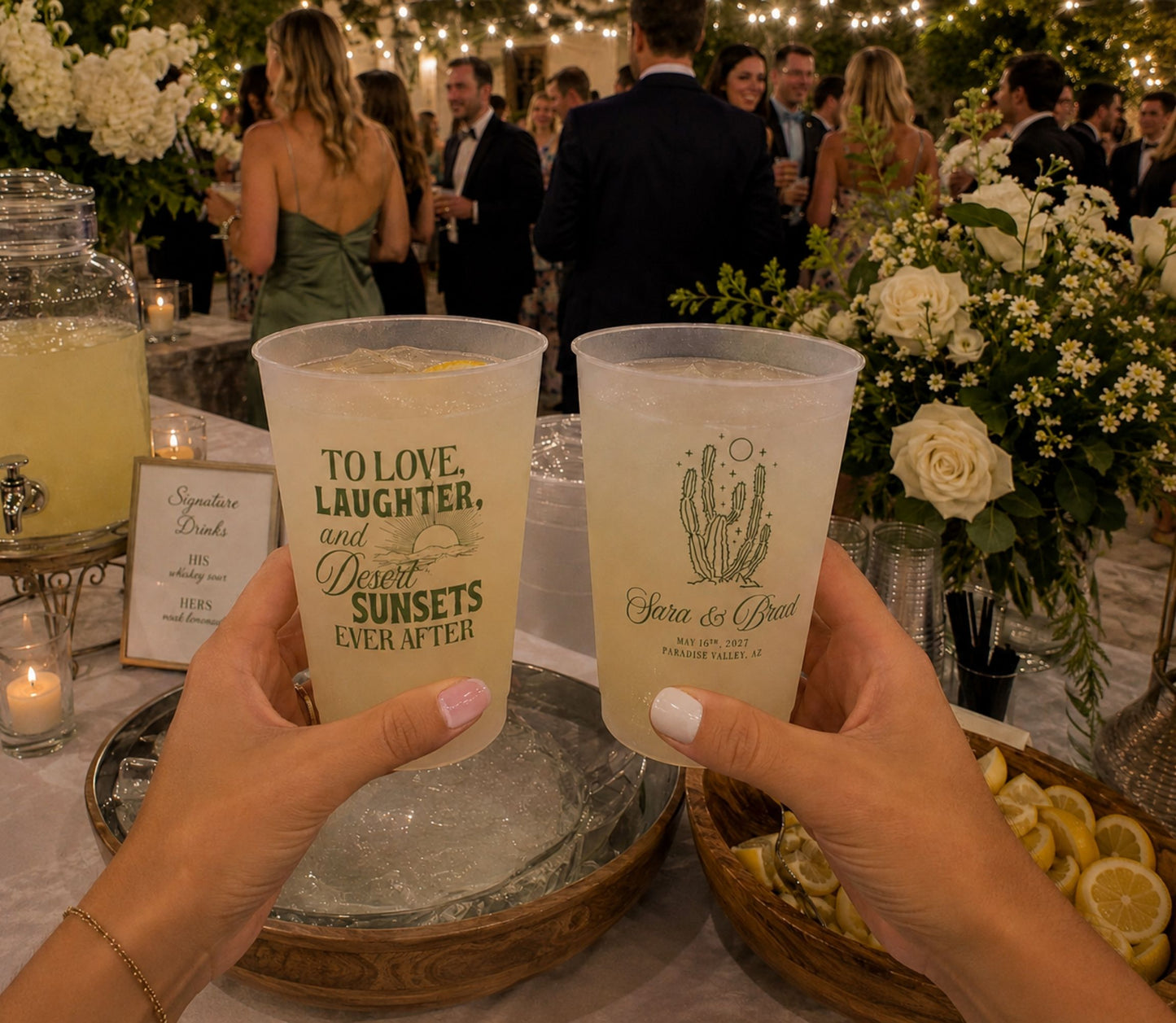 Reusable frosted plastic wedding cup inspired by Arizona desert sunsets and personalized for a destination wedding.
Modern desert wedding cup featuring custom names, wedding date, and elegant cactus illustration.
Destination wedding frosted cup showcasing southwest-inspired artwork with personalized couple information.