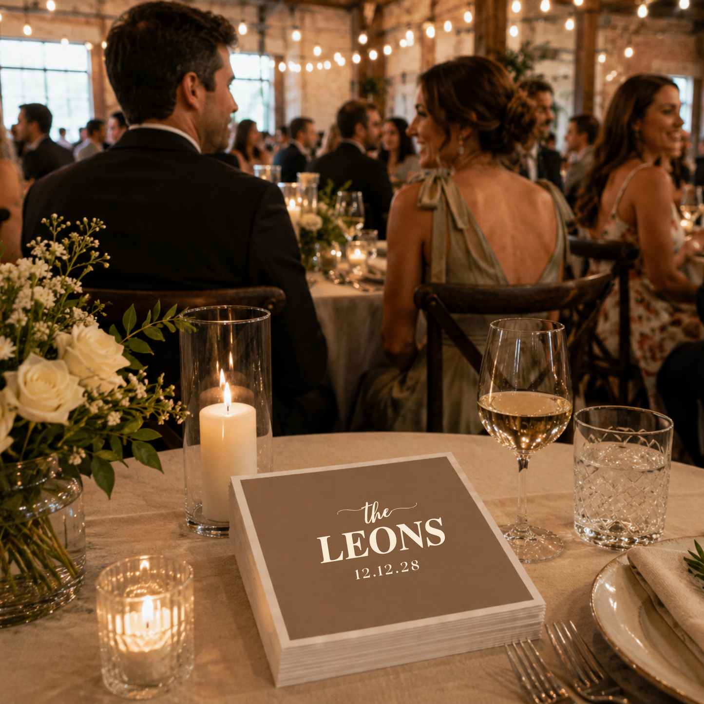 Taupe minimalist wedding napkin featuring personalized family surname and wedding date.