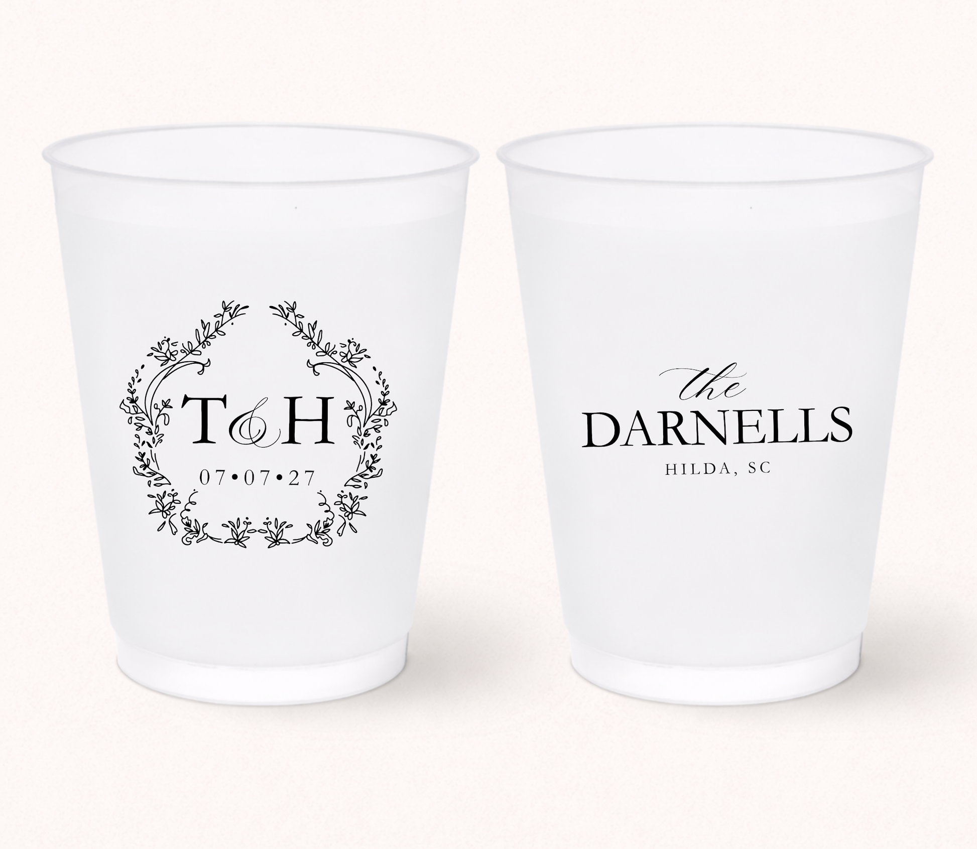 Monogram wedding frosted cups with floral crest design
Elegant personalized wedding cups
Classic wedding frosted cups with initials
Garden wedding drinkware with floral wreath illustration
Custom wedding monogram cups with wedding date
Southern wedding favor frosted cups
