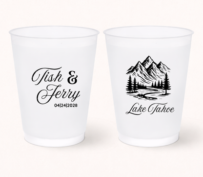 Custom mountain wedding frosted cups with mountain artwork, personalized names, destination location details, and outdoor wedding design