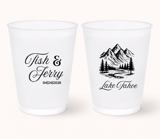 Custom mountain wedding frosted cups with mountain artwork, personalized names, destination location details, and outdoor wedding design