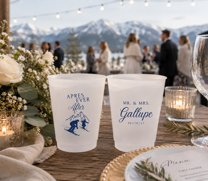 Personalized ski wedding frosted cups featuring mountain artwork, skiers, custom family name, and wedding date