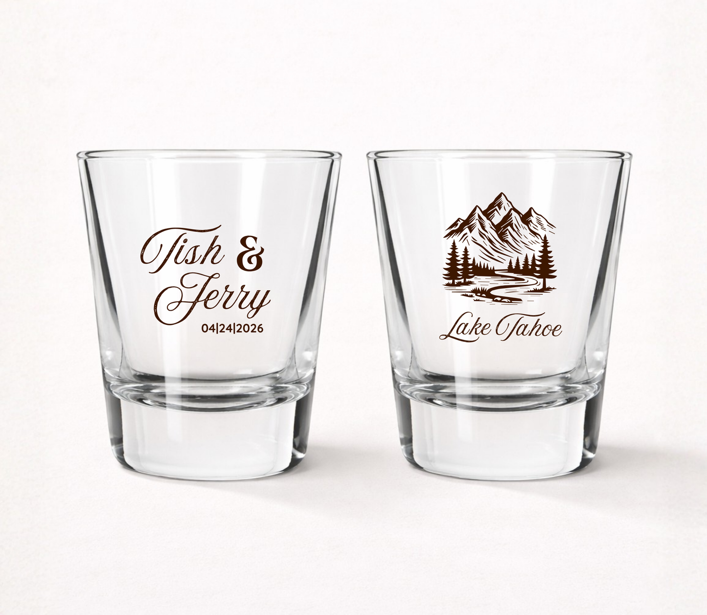 Personalized clear wedding shot glasses featuring a scenic mountain landscape with custom couple names and wedding date for mountain weddings.