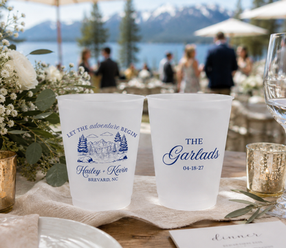 Personalized mountain wedding frosted cups featuring forest landscape artwork, custom names, wedding date, and Brevard NC location