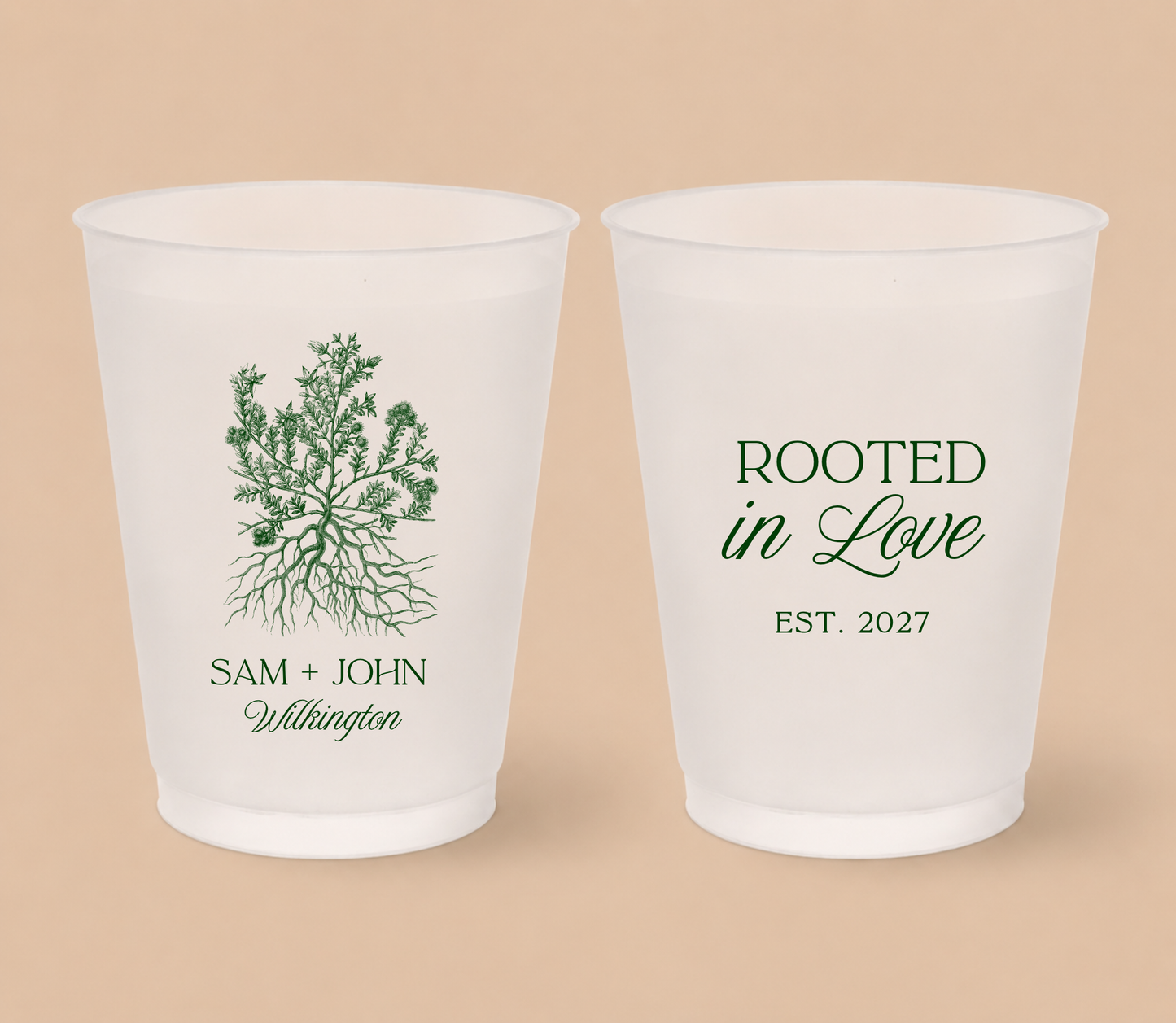 White frosted wedding cups featuring a botanical roots illustration with personalized couple names, family surname, and Rooted In Love design.