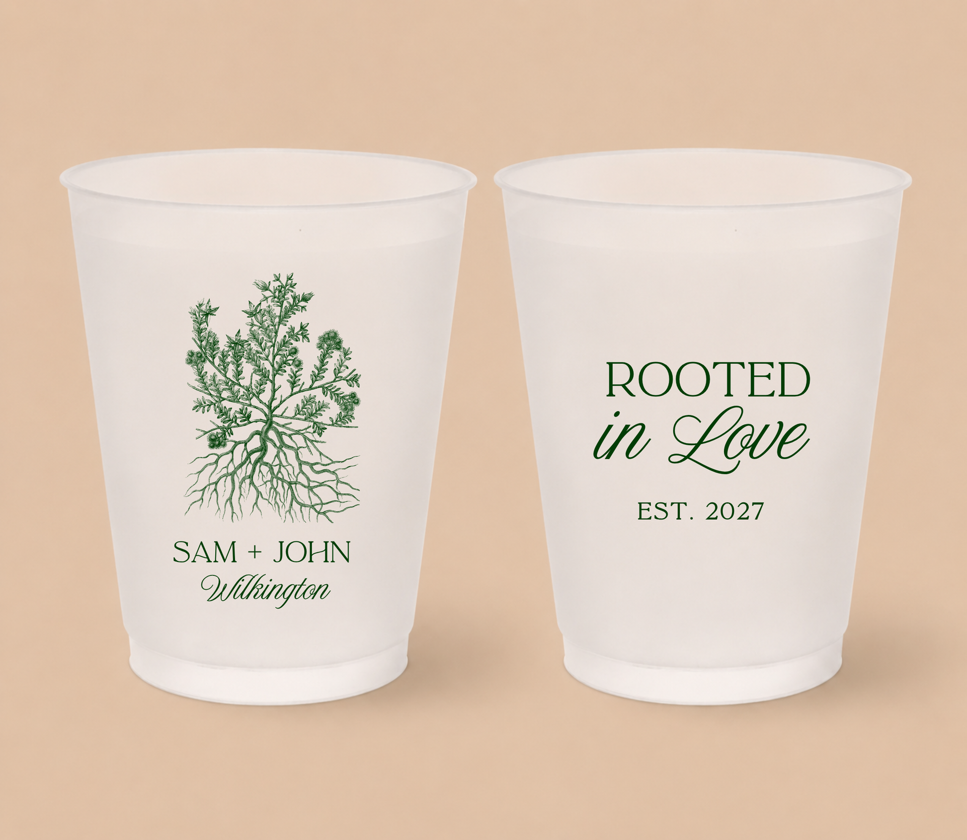 White frosted wedding cups featuring a botanical roots illustration with personalized couple names, family surname, and Rooted In Love design.