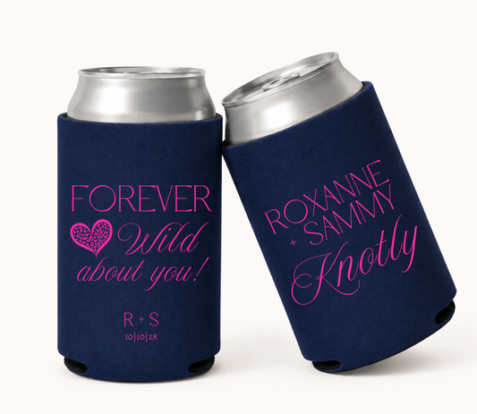 Personalized navy blue wedding can coolers featuring Forever Wild About You wording with a heart design, couple initials and wedding date, and Roxanne and Sammy names in vibrant hot pink lettering.