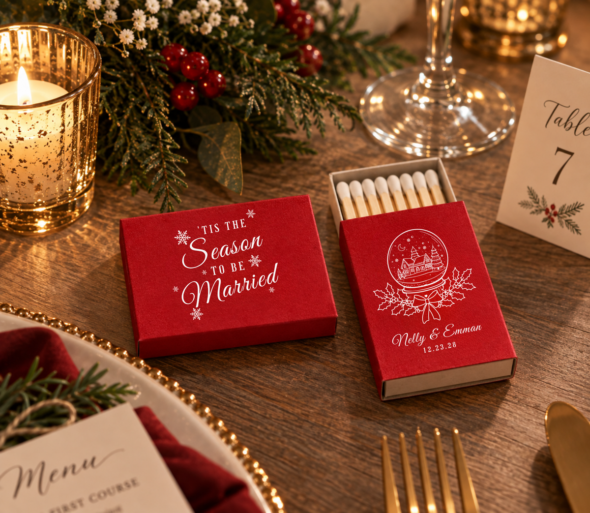 Personalized holiday wedding matchboxes featuring Christmas snow globe artwork, holly accents, and custom wedding details.
