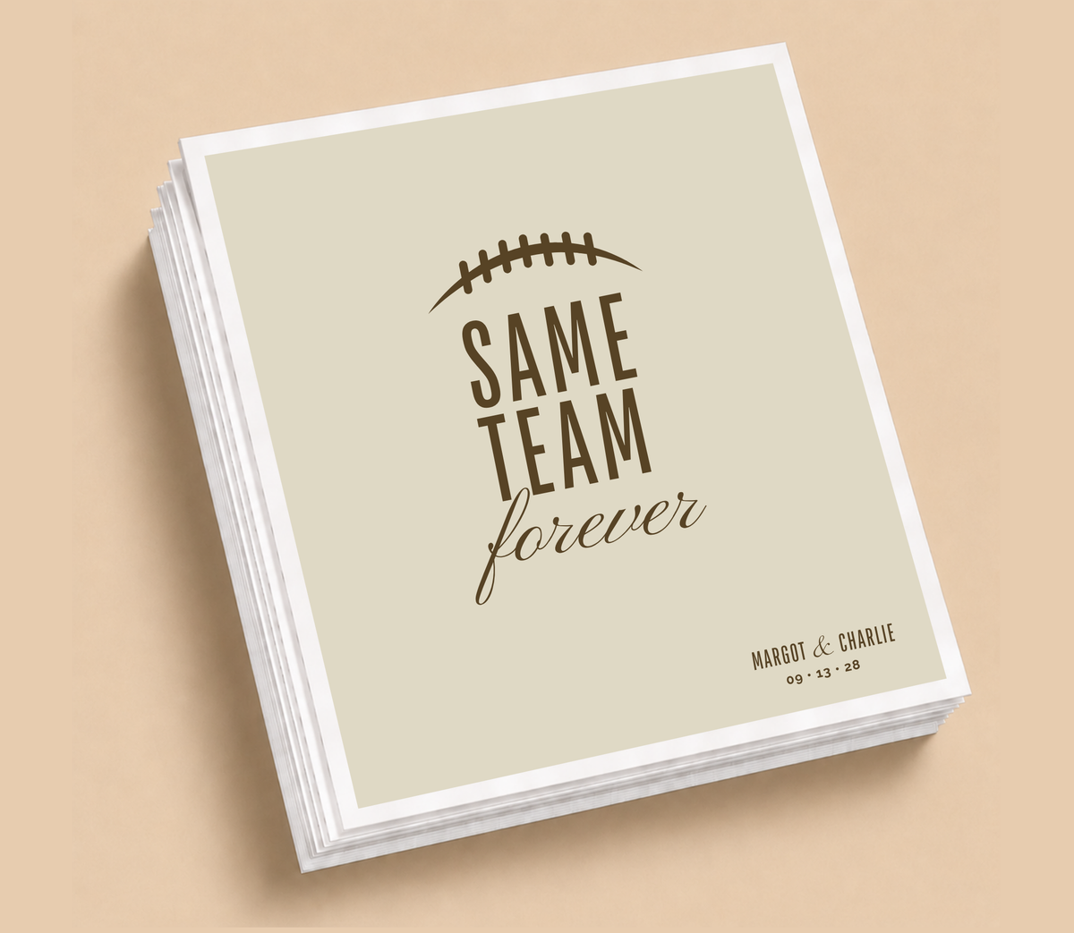 Personalized Same Team Forever football wedding napkins featuring football lace artwork, brown lettering, elegant script, custom couple names, and wedding date.