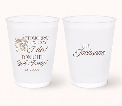 Personalized rehearsal dinner frosted cups featuring wedding rings artwork and custom family name