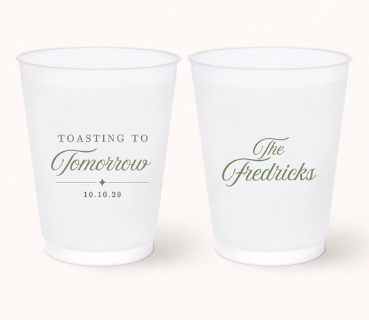 Personalized Toasting To Tomorrow frosted cups featuring custom family name and wedding date
