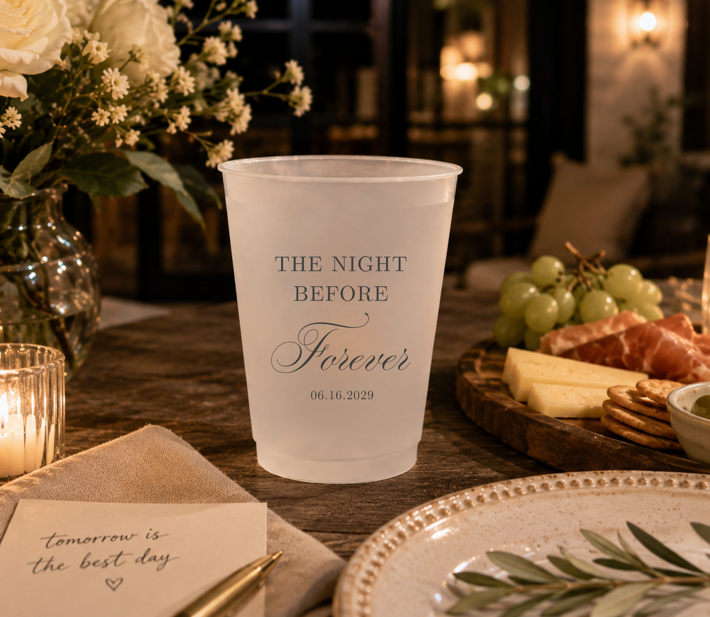 Personalized frosted cups featuring Night Before Forever wording with custom couple names and wedding date