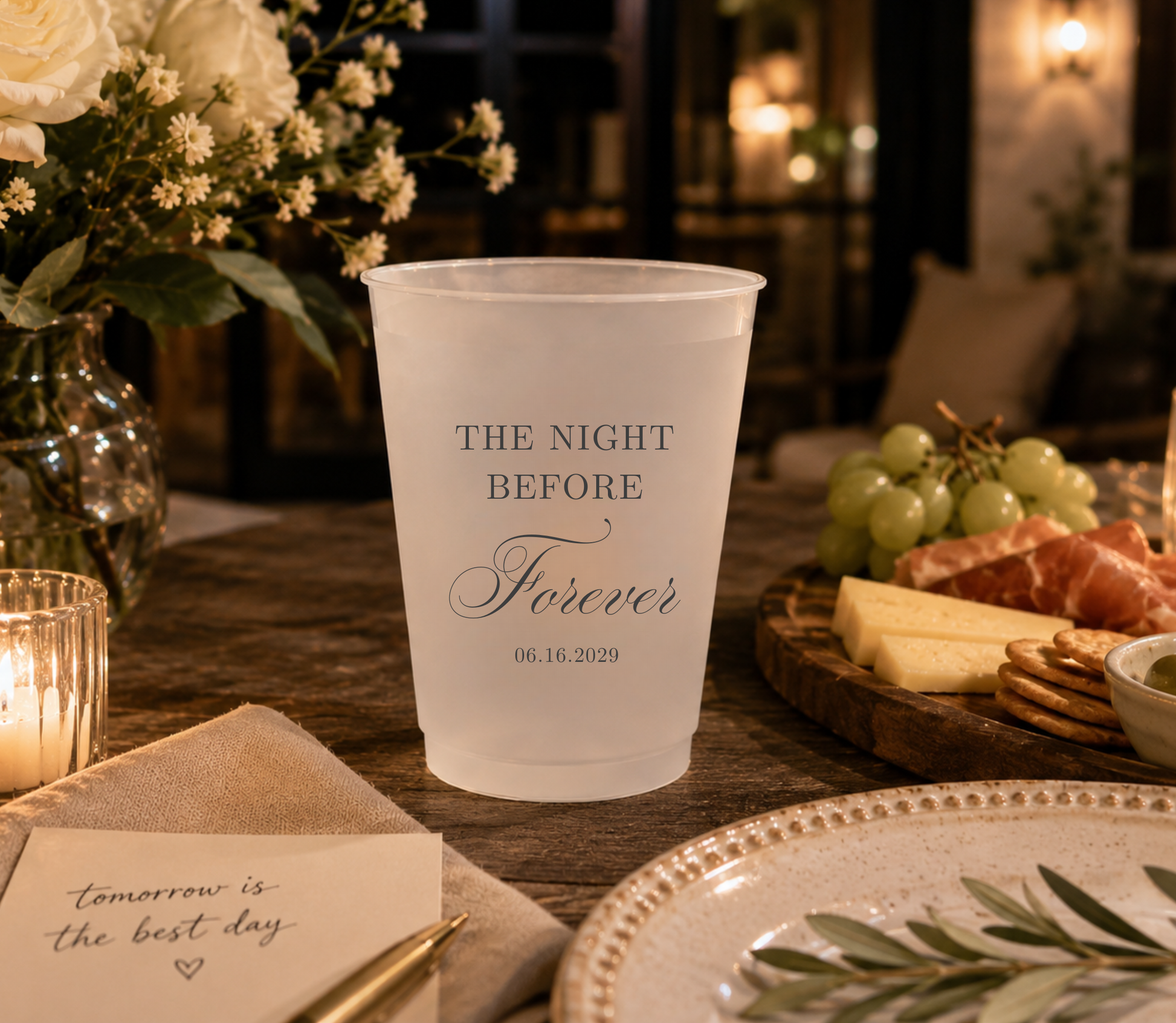 Personalized frosted cups featuring Night Before Forever wording with custom couple names and wedding date