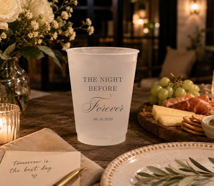 Personalized frosted cups featuring Night Before Forever wording with custom couple names and wedding date