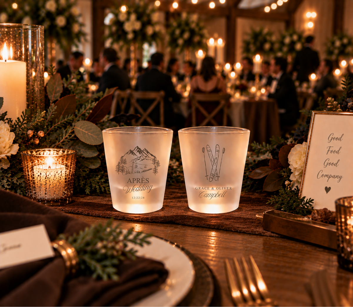 Mountain wedding shot glasses featuring crossed skis, alpine scenery, couple names, and wedding date.