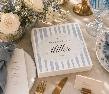 Personalized blue and white wedding cocktail napkins with elegant script design for coastal weddings and bridal showers