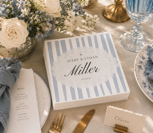 Personalized blue and white wedding cocktail napkins with elegant script design for coastal weddings and bridal showers