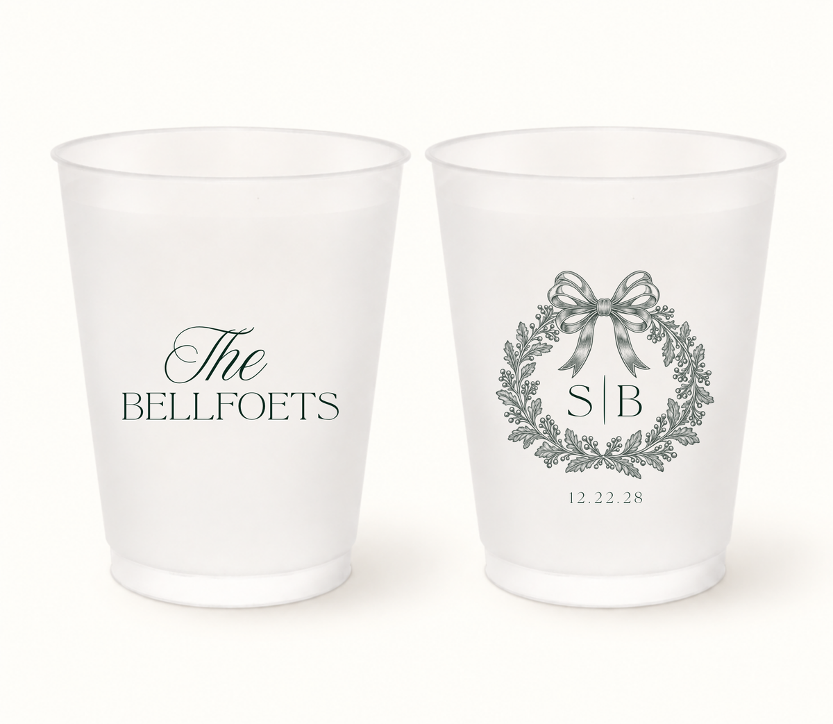 Personalized Christmas wedding frosted cups featuring an elegant bow wreath, custom initials, family name, and wedding date.