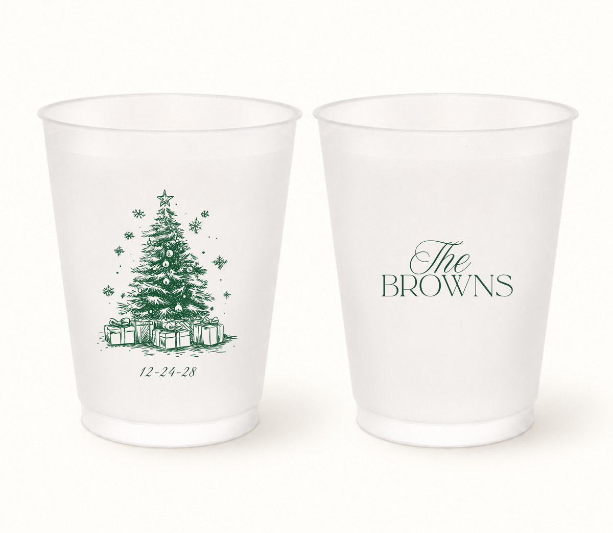 Personalized Christmas wedding frosted cups featuring a detailed Christmas tree, custom family name, wedding date, snowflakes, ornaments, and presents.