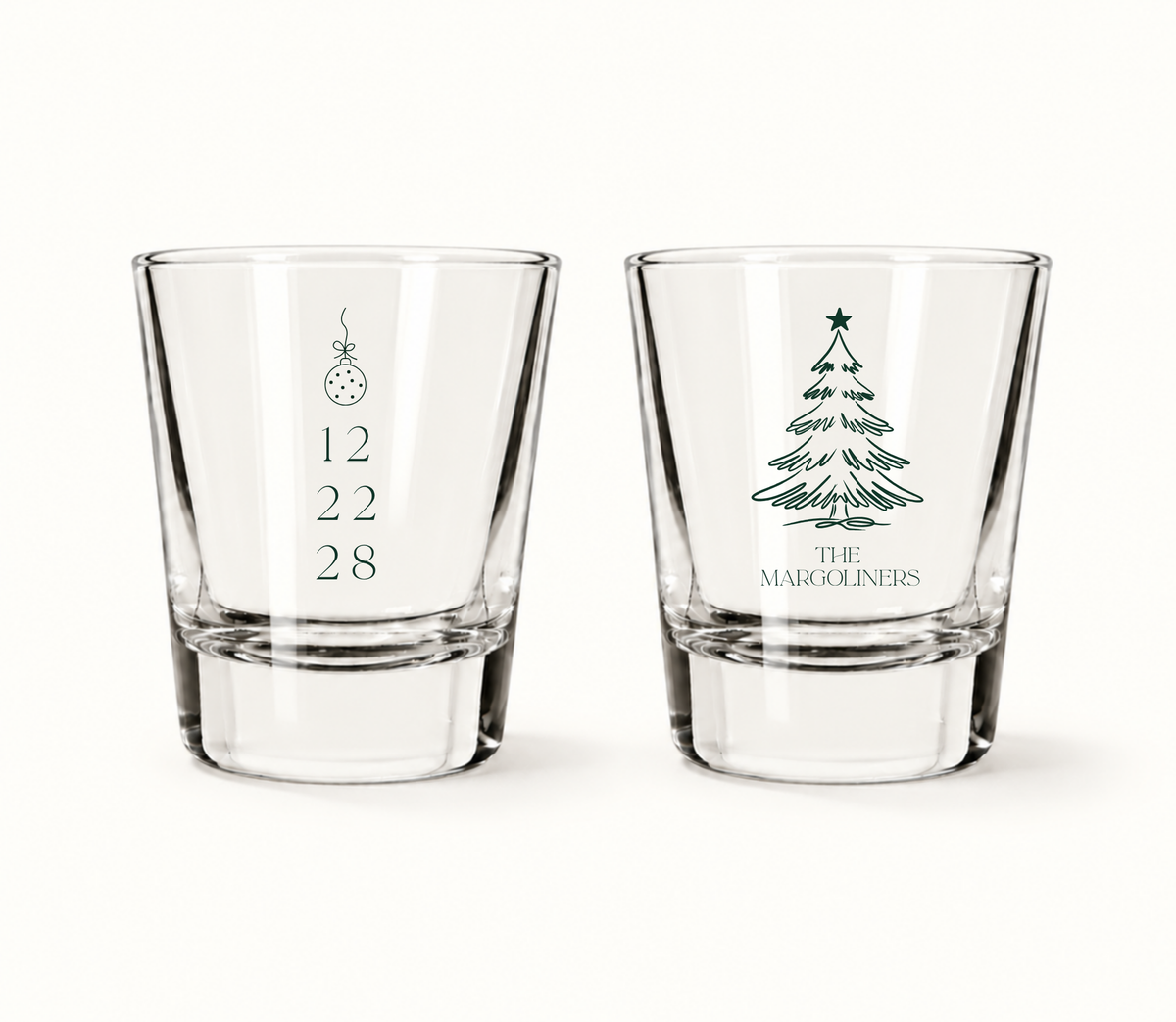 Personalized Christmas wedding shot glasses featuring a Christmas ornament, wedding date, Christmas tree illustration, and family name.