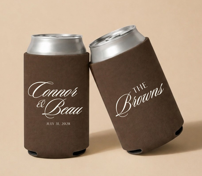 Personalized chocolate brown wedding can coolers featuring Connor and Beau in elegant ivory script with July 31, 2028 wedding date and The Browns family name.

