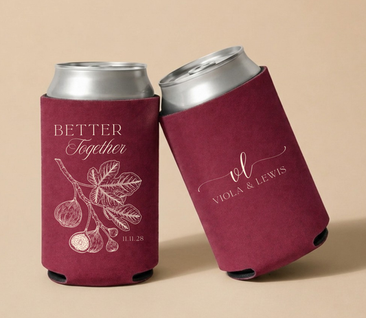 Burgundy personalized wedding can coolers featuring a vintage fig branch illustration, custom couple names Viola and Lewis, and wedding date in elegant botanical styling.

