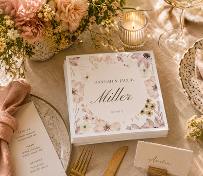 Personalized blush floral wedding cocktail napkins with elegant script design for bridal showers and garden weddings