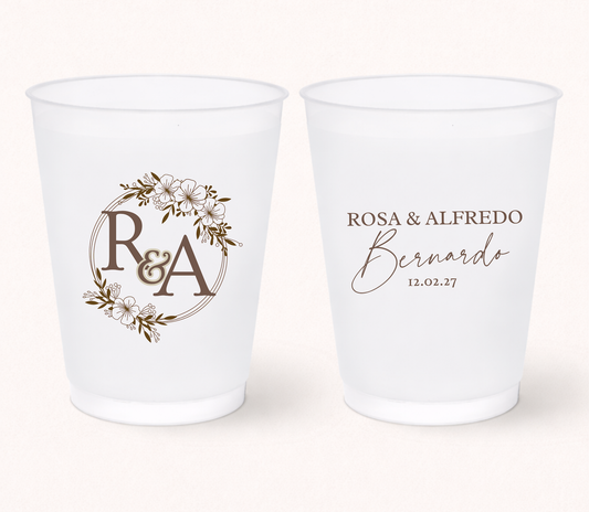 Floral monogram wedding frosted cups
Elegant personalized wedding cups with floral wreath
Custom frosted cups with initials and names
Romantic wedding drinkware with floral design
Personalized bridal shower cups
Elegant custom wedding favor cups